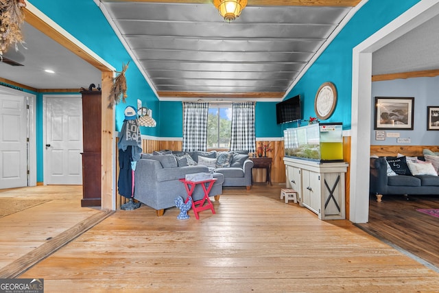 67 Lagoon Rd, Statesboro, GA 30461 - living area with wood-type flooring, a wainscoted wall, ornamental molding, and a barn door