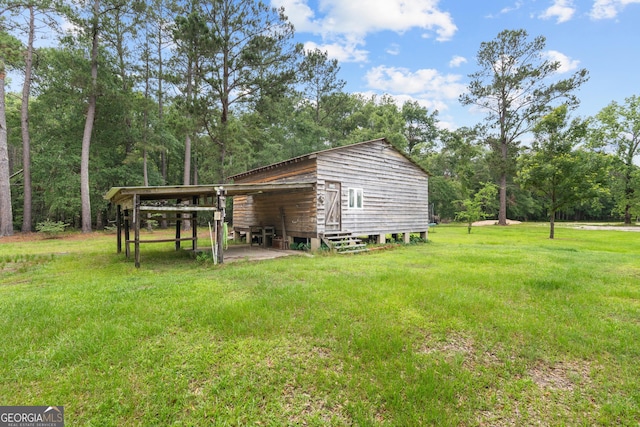 67 Lagoon Rd, Statesboro, GA 30461 - view of green lawn with entry steps
