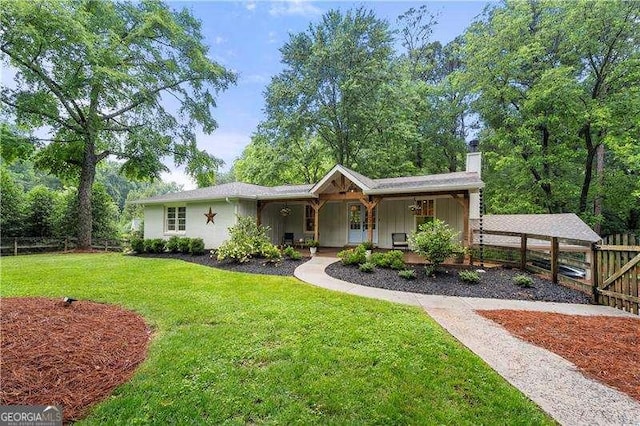 2020 New Kemp Rd, Marietta, GA 30066 - single story home with a chimney, a porch, and board and batten siding
