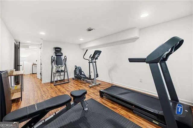 2020 New Kemp Rd, Marietta, GA 30066 - workout area featuring wood finished floors, recessed lighting, and baseboards