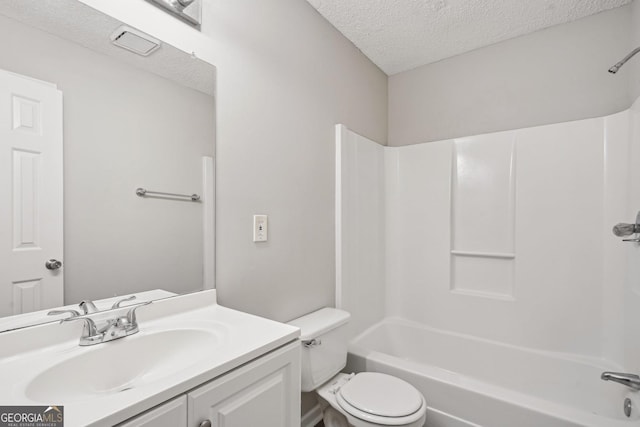 484 Culberson St SW, Atlanta, GA 30310 - bathroom with a textured ceiling, vanity, and bathing tub / shower combination
