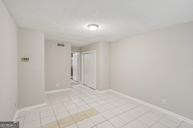484 Culberson St SW, Atlanta, GA 30310 - unfurnished room featuring a textured ceiling and light tile patterned flooring