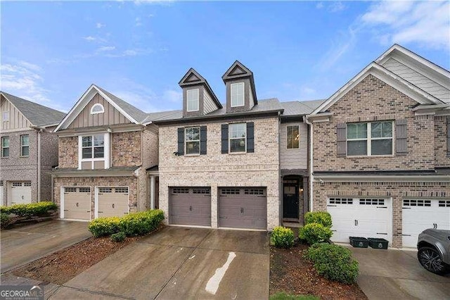 2069 Brightleaf Way Unit 123, Marietta, GA 30060 - view of front facade with brick siding, a garage, and driveway