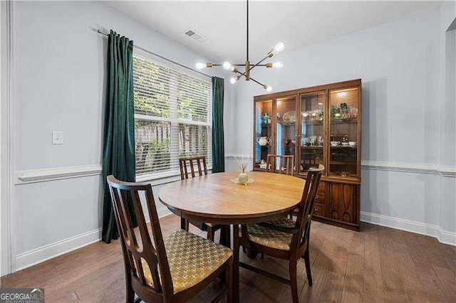 2069 Brightleaf Way Unit 123, Marietta, GA 30060 - dining room featuring a chandelier, wood finished floors, and baseboards