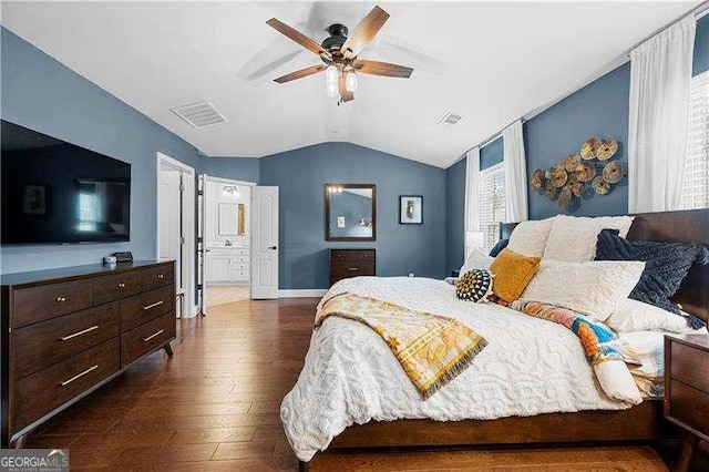 2069 Brightleaf Way Unit 123, Marietta, GA 30060 - bedroom featuring dark wood-style floors, lofted ceiling, ceiling fan, connected bathroom, and baseboards