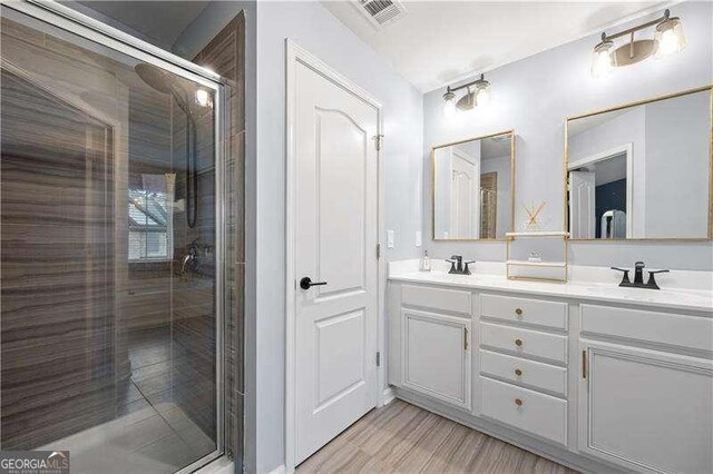 2069 Brightleaf Way Unit 123, Marietta, GA 30060 - full bathroom featuring double vanity and a stall shower