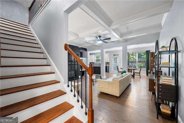 2069 Brightleaf Way Unit 123, Marietta, GA 30060 - living room with hardwood / wood-style floors, coffered ceiling, ceiling fan, stairs, and beam ceiling