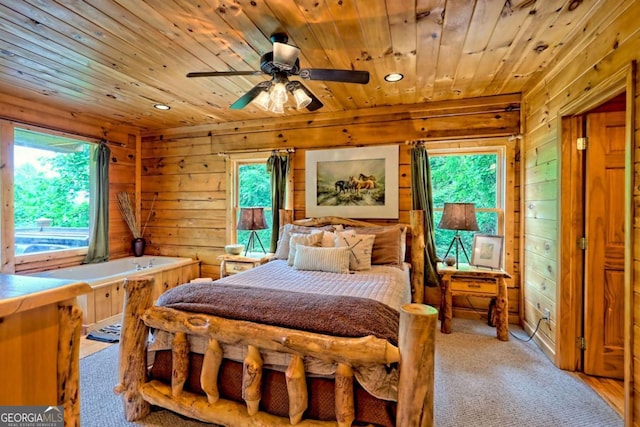 481 Georgianna Ln, Bryson City, NC 28713 - carpeted bedroom featuring wooden ceiling, multiple windows, wood walls, and recessed lighting