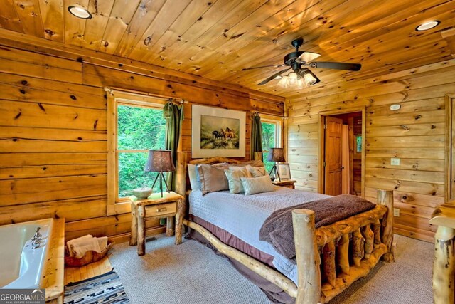 481 Georgianna Ln, Bryson City, NC 28713 - carpeted bedroom with wooden walls, wooden ceiling, and recessed lighting