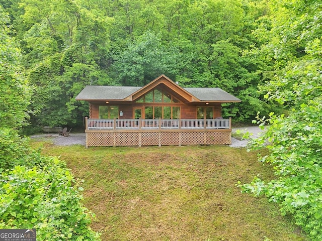 481 Georgianna Ln, Bryson City, NC 28713 - rear view of house featuring a forest view, a deck, and a lawn