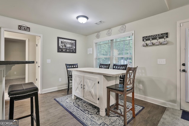 279 Brenna Ct, Luthersville, GA 30251 - dining room featuring dark wood-style flooring and baseboards