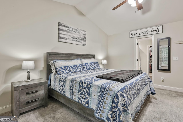 279 Brenna Ct, Luthersville, GA 30251 - bedroom featuring carpet flooring, lofted ceiling, baseboards, a spacious closet, and a ceiling fan