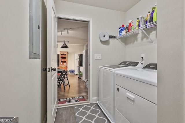 279 Brenna Ct, Luthersville, GA 30251 - laundry room featuring washing machine and clothes dryer, wood finished floors, and electric panel
