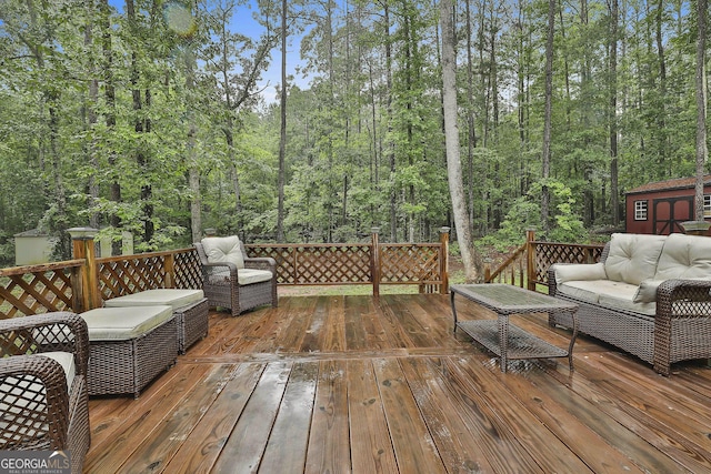 279 Brenna Ct, Luthersville, GA 30251 - wooden deck with outdoor lounge area and a view of trees