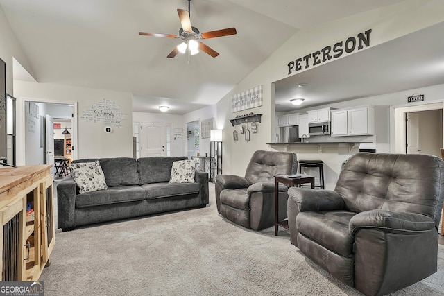 279 Brenna Ct, Luthersville, GA 30251 - living room with lofted ceiling, ceiling fan, and carpet