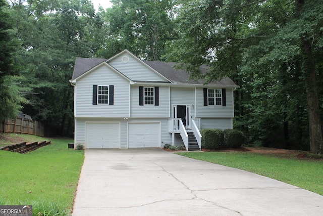 1408 Wyndham Way, Bethlehem, GA 30620 - raised ranch featuring concrete driveway and a garage
