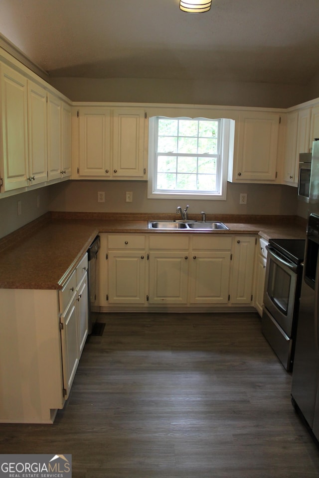 1408 Wyndham Way, Bethlehem, GA 30620 - kitchen featuring stainless steel appliances, white cabinets, and dark wood-type flooring