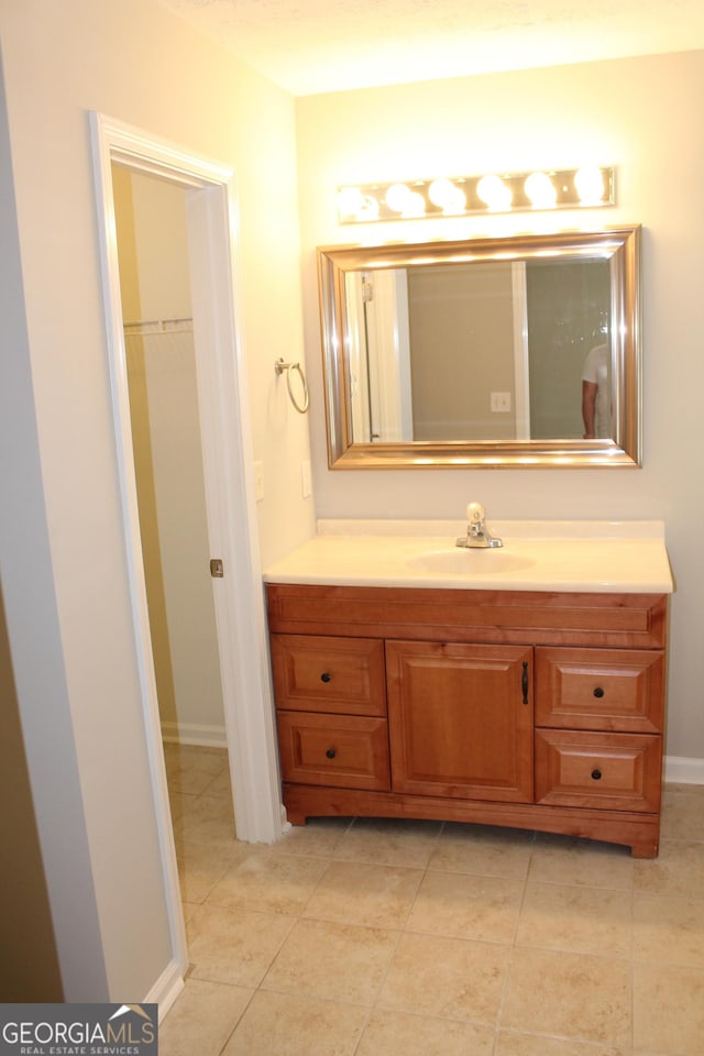 1408 Wyndham Way, Bethlehem, GA 30620 - bathroom featuring vanity and tile patterned flooring