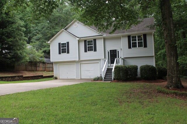 1408 Wyndham Way, Bethlehem, GA 30620 - bi-level home with driveway and a garage