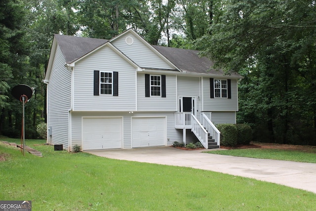 1408 Wyndham Way, Bethlehem, GA 30620 - raised ranch featuring driveway, a front lawn, a garage, view of wooded area, and roof with shingles