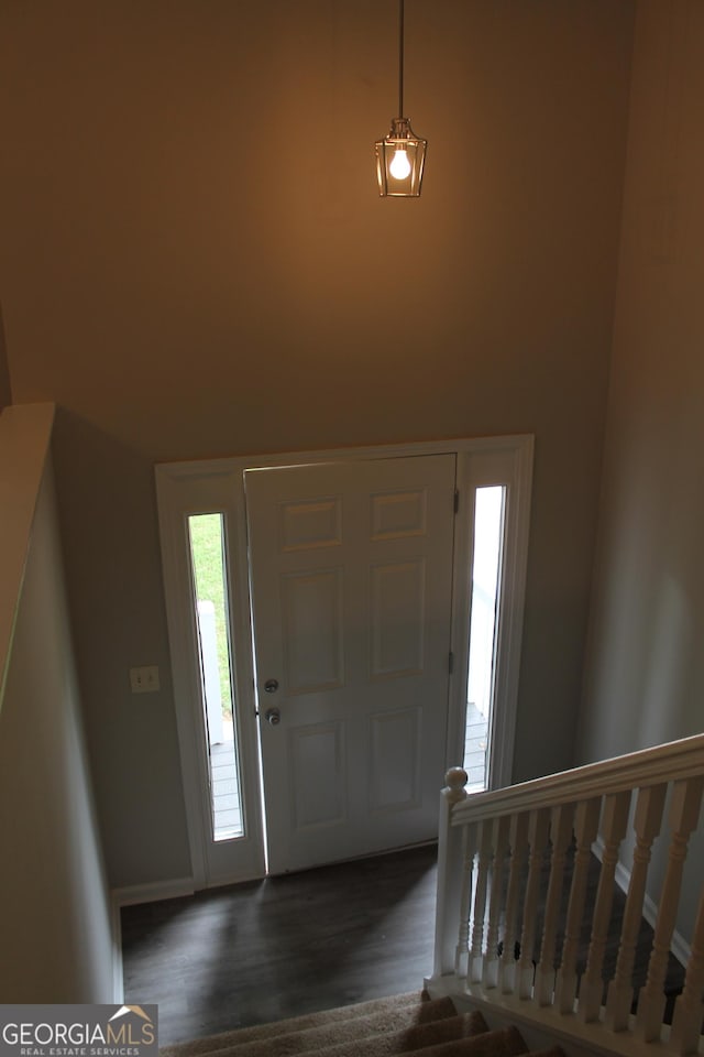 1408 Wyndham Way, Bethlehem, GA 30620 - foyer entrance with dark wood-style flooring and baseboards