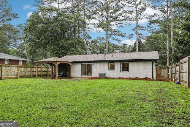 3351 Landrum Dr SE, Smyrna, GA 30082 - back of house with a gazebo and central AC unit