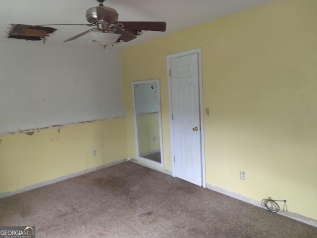 390 Burg Rd, Locust Grove, GA 30248 - spare room featuring carpet, ceiling fan, and baseboards