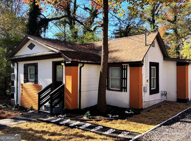 2977 5th St SW, Atlanta, GA 30315 - view of front of property with stucco siding and roof with shingles