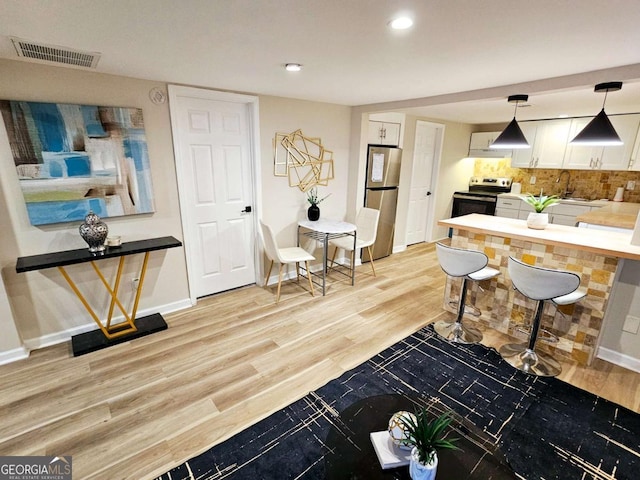 2977 5th St SW, Atlanta, GA 30315 - living area featuring recessed lighting and light wood-type flooring