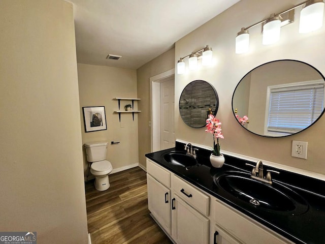 2977 5th St SW, Atlanta, GA 30315 - full bathroom with wood finished floors and double vanity