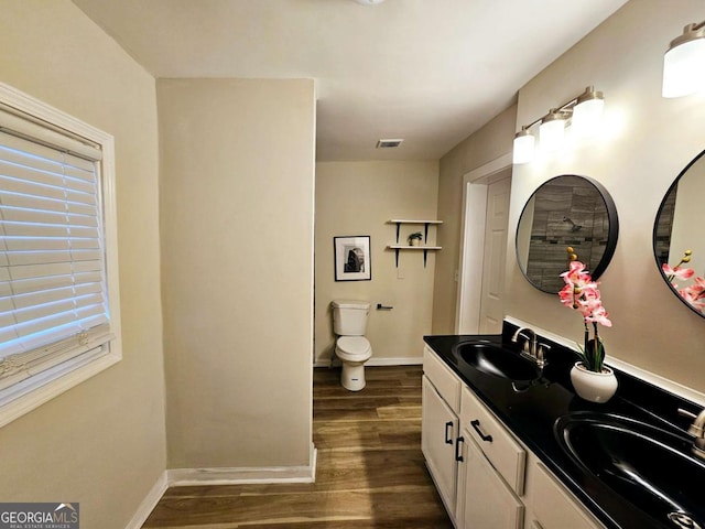 2977 5th St SW, Atlanta, GA 30315 - bathroom featuring wood finished floors and double vanity