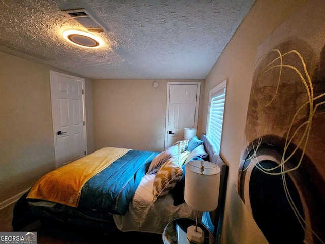 2977 5th St SW, Atlanta, GA 30315 - bedroom with a textured ceiling