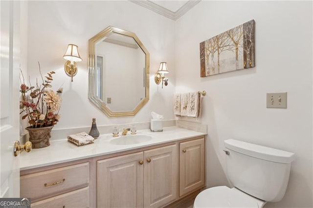 440 Carybell Ln, Alpharetta, GA 30004 - half bathroom featuring vanity, toilet, and crown molding