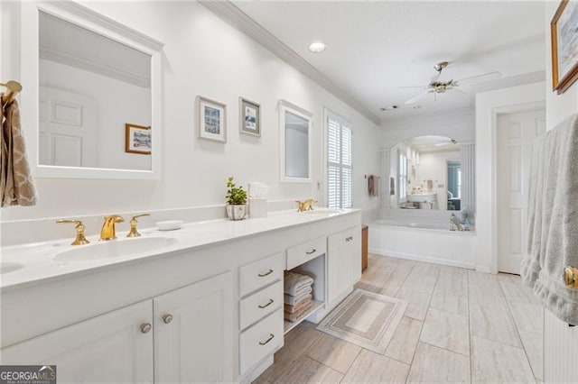 440 Carybell Ln, Alpharetta, GA 30004 - full bath with double vanity, crown molding, ceiling fan, and a garden tub