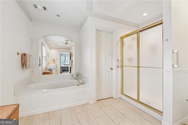 440 Carybell Ln, Alpharetta, GA 30004 - bathroom with crown molding, a garden tub, a stall shower, and ceiling fan