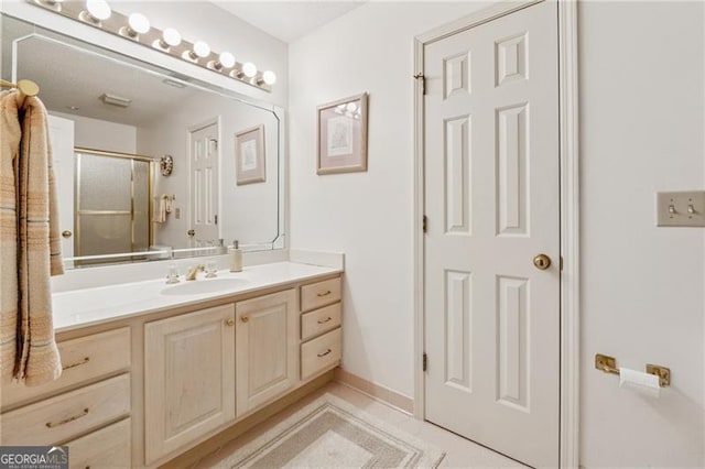 440 Carybell Ln, Alpharetta, GA 30004 - bathroom with vanity, a shower with door, and tile patterned floors