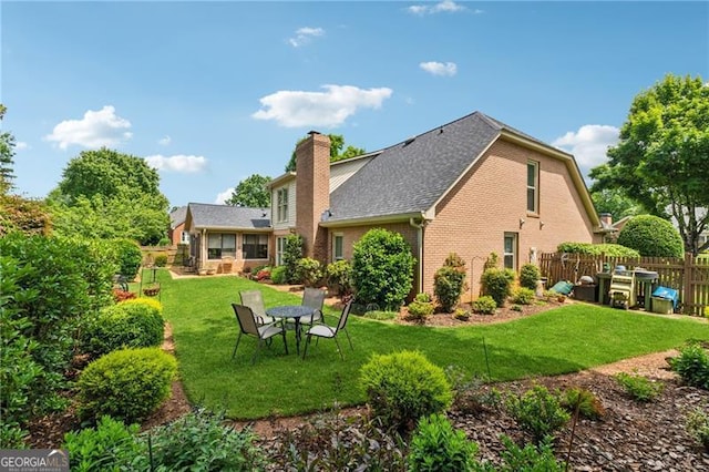 440 Carybell Ln, Alpharetta, GA 30004 - back of house featuring a chimney and brick siding