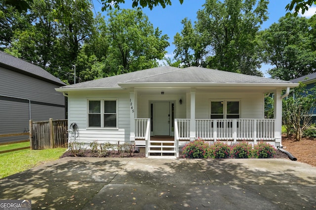 1245 Ladd St SW, Atlanta, GA 30310 - view of front facade featuring a porch and roof with shingles