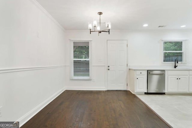 1245 Ladd St SW, Atlanta, GA 30310 - unfurnished dining area featuring a chandelier, healthy amount of natural light, crown molding, light wood-style floors, and recessed lighting