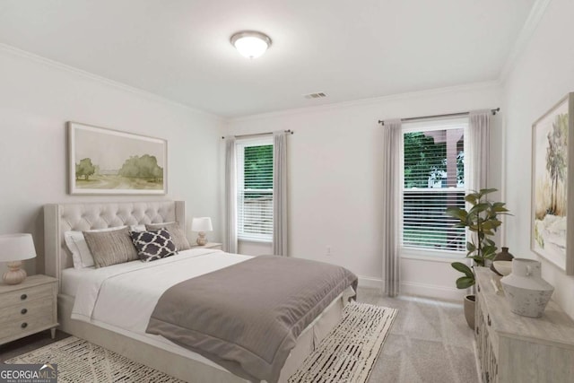 1245 Ladd St SW, Atlanta, GA 30310 - bedroom with multiple windows, light colored carpet, and crown molding