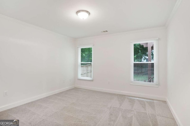 1245 Ladd St SW, Atlanta, GA 30310 - empty room featuring ornamental molding, plenty of natural light, and carpet flooring