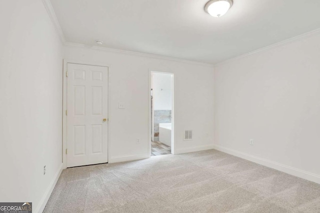 1245 Ladd St SW, Atlanta, GA 30310 - carpeted spare room with ornamental molding and baseboards