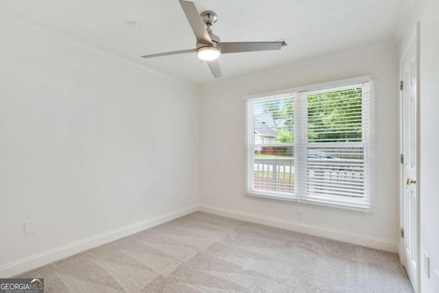 1245 Ladd St SW, Atlanta, GA 30310 - spare room with ceiling fan, light carpet, and crown molding