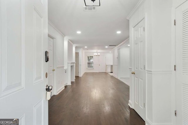 1245 Ladd St SW, Atlanta, GA 30310 - foyer featuring wood finished floors, recessed lighting, a chandelier, and crown molding