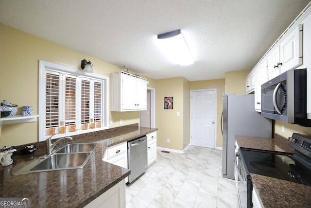 1010 Calls Creek Cir, Watkinsville, GA 30677 - kitchen with stainless steel appliances, a sink, light marble finish floors, and white cabinets