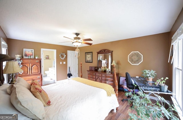 1010 Calls Creek Cir, Watkinsville, GA 30677 - bedroom featuring wood finished floors, a ceiling fan, and connected bathroom