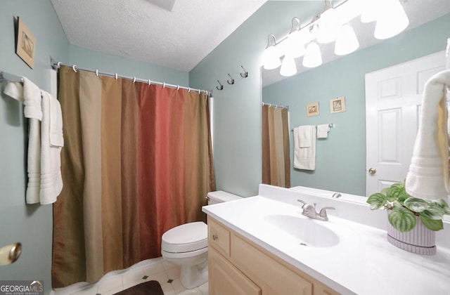 1010 Calls Creek Cir, Watkinsville, GA 30677 - bathroom featuring toilet, vanity, a textured ceiling, tile patterned floors, and curtained shower