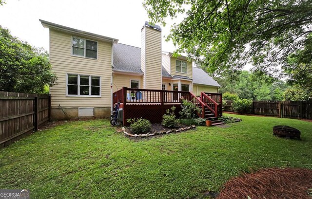 1010 Calls Creek Cir, Watkinsville, GA 30677 - rear view of house with a fire pit, a deck, a chimney, and stairway