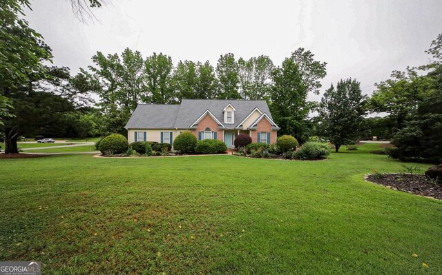 1010 Calls Creek Cir, Watkinsville, GA 30677 - view of front of house with a front lawn and view of scattered trees
