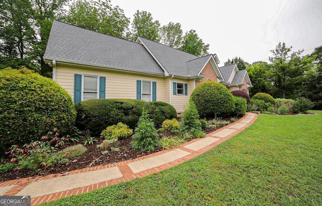 1010 Calls Creek Cir, Watkinsville, GA 30677 - view of side of property featuring a lawn and a shingled roof